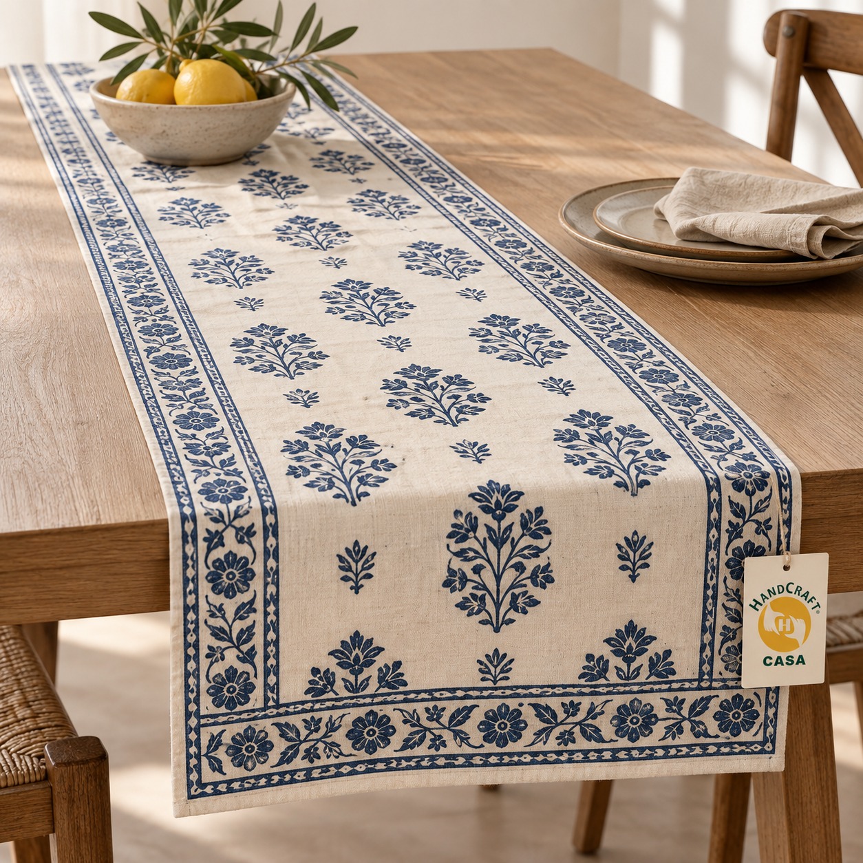 Illustrative blue floral block print table runner on a dining table
