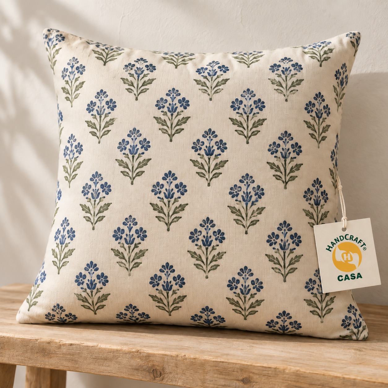 Illustrative floral block print cotton cushion cover on a chair