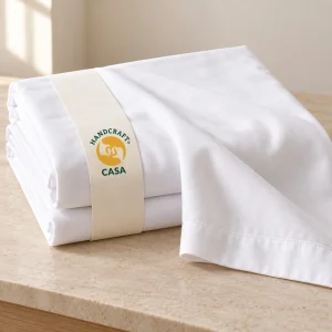 Poly-Cotton Hotel Bed Sheet with a removable Casa presentation paper band.