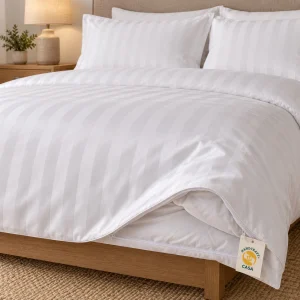 White Satin Stripe Hotel Duvet Cover with a removable Casa presentation tag.